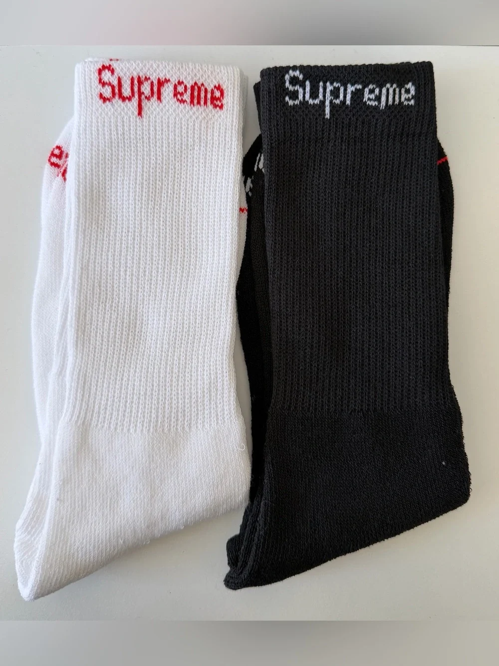 Supreme socks 2 pair one white one black FAST SHIPPINF